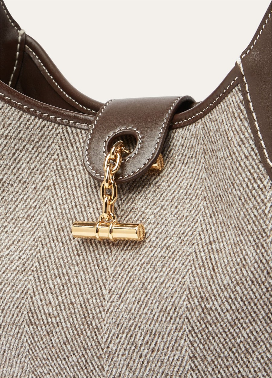 middelgrote tas van zuivere scheerwol naturel bruindonkere chocoladezoethoutzonnegoud