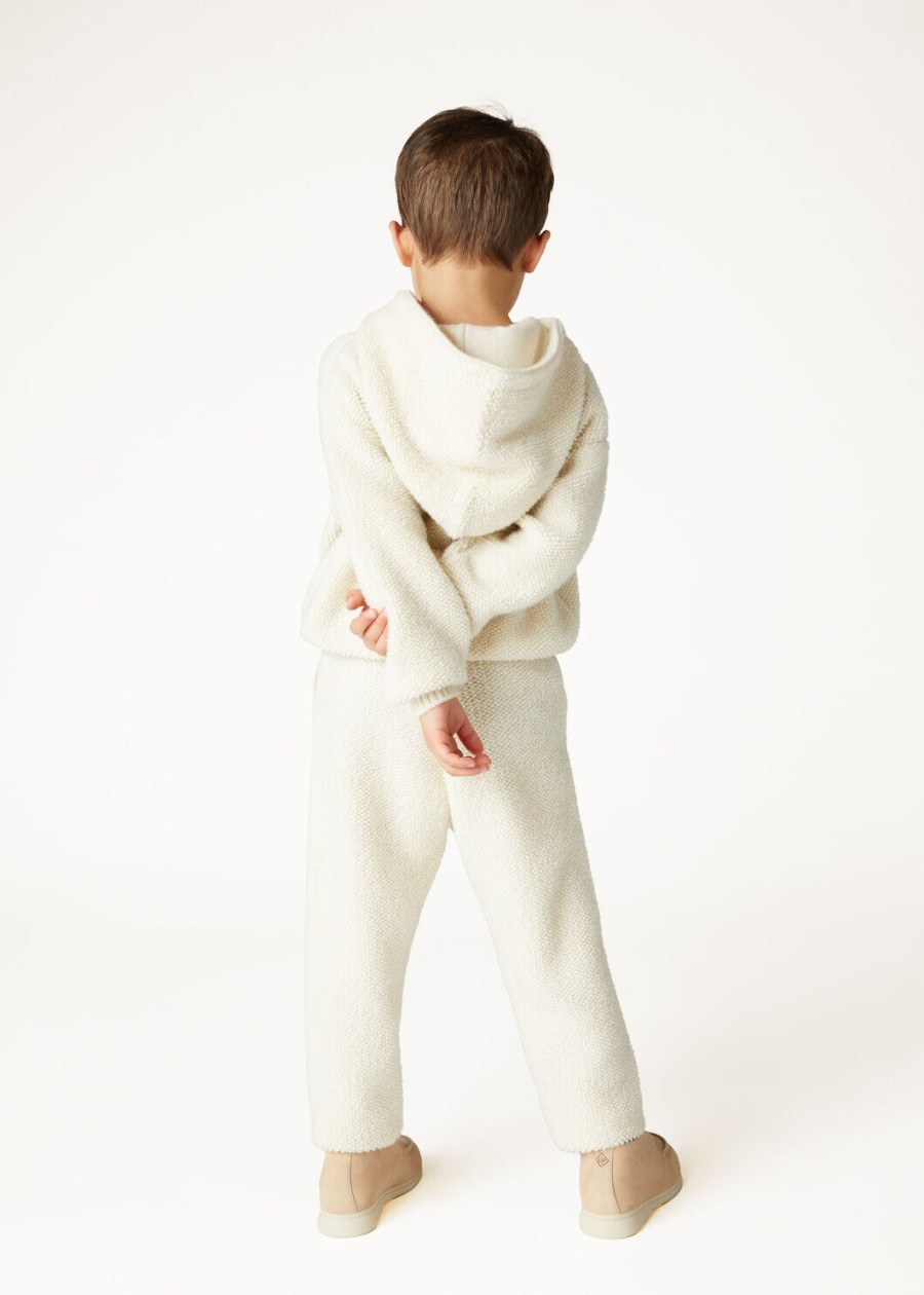 kinderbroek van kasjmier met nougatprint en krullend effect