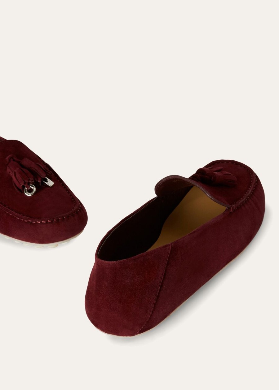 instappers met stippenzool van geitenleer in de kleur wild plum.
