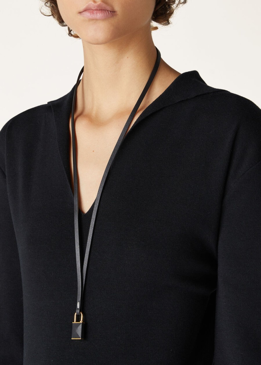 extra hangslotketting van zwart kalfsleer met gouden zon-sieraden
