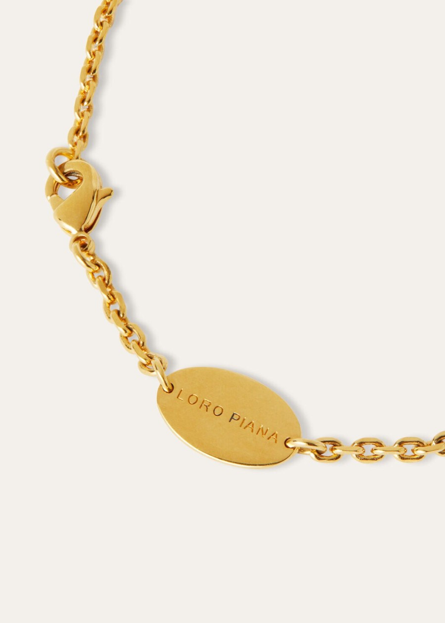 cardo messing ketting met zonnesieraden goudkleurig