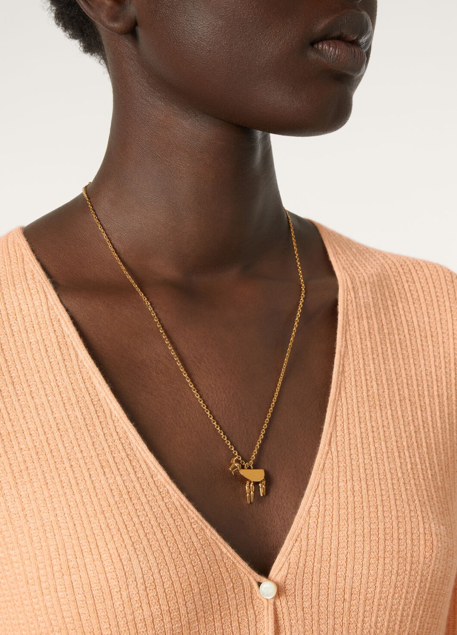 geitenketting van messing met zonmotief gouden sieraden