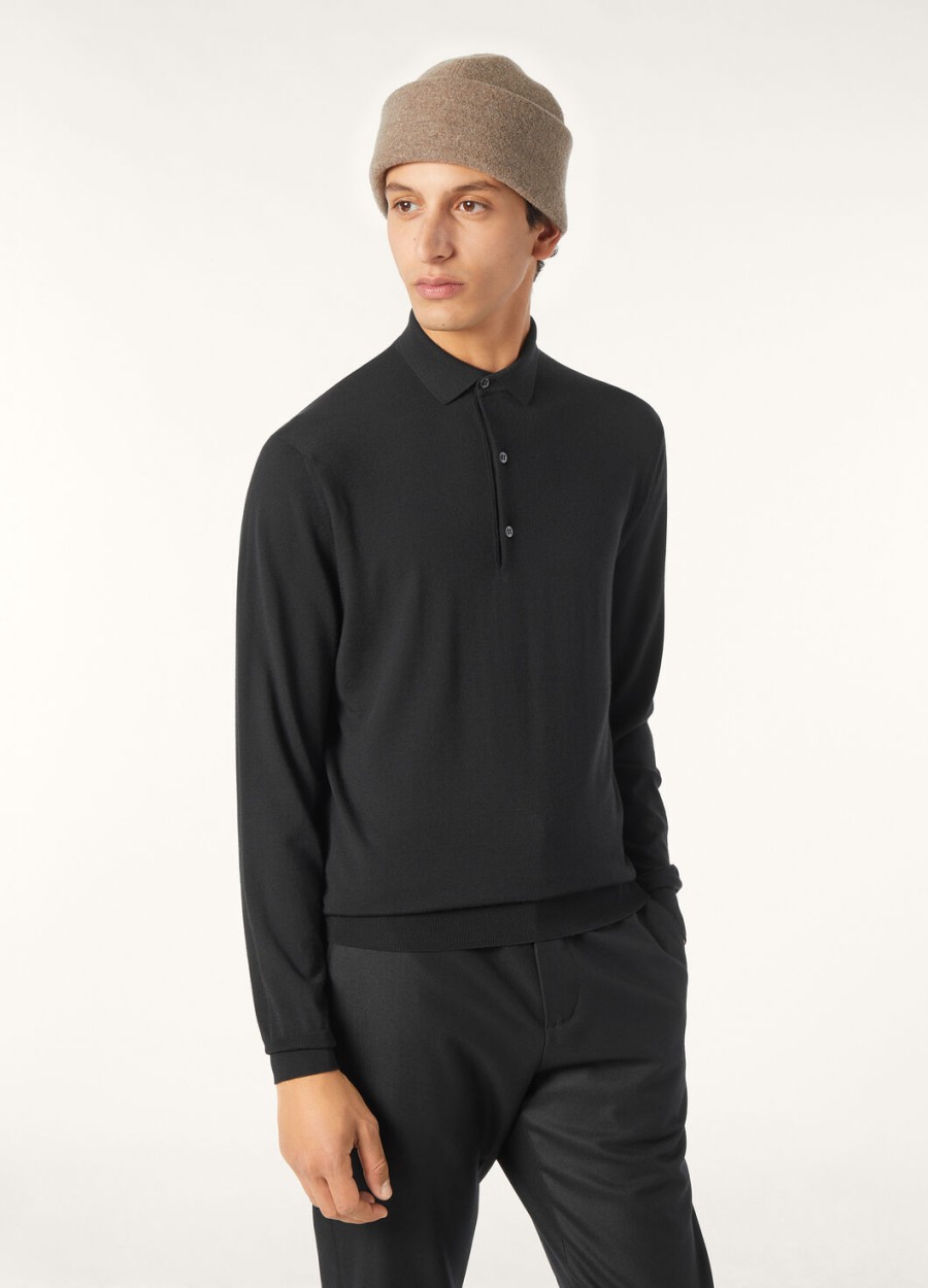 het zwarte poloshirt van the gift of kings