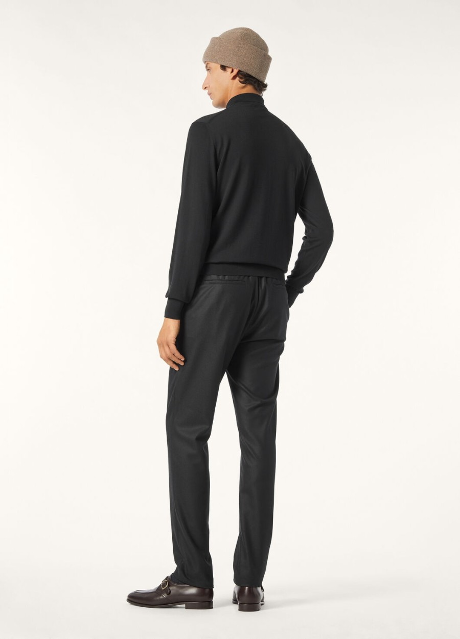 het zwarte poloshirt van the gift of kings
