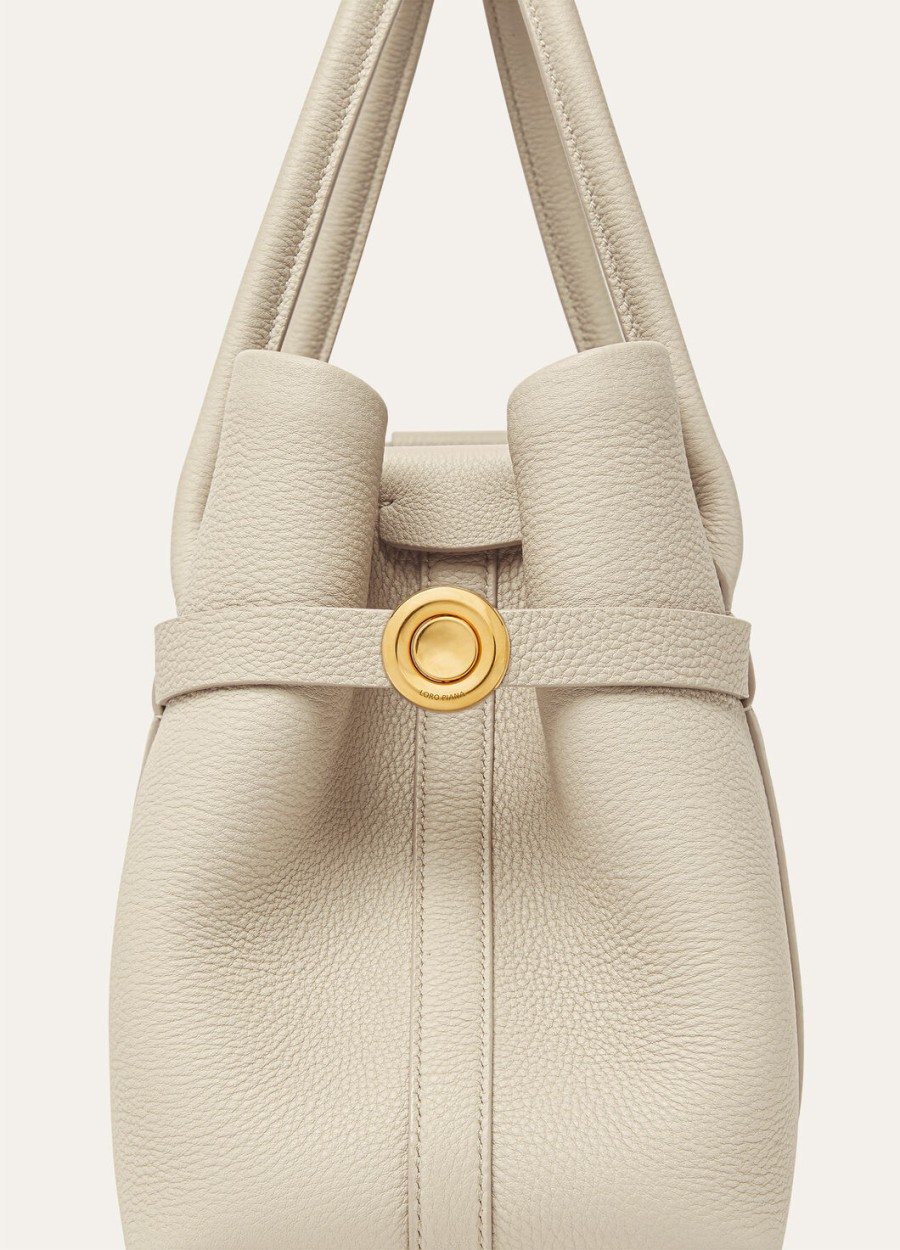 kleine ghiera shopper tas van kalfsleer in de kleuren licht travertijnzonnegoud.