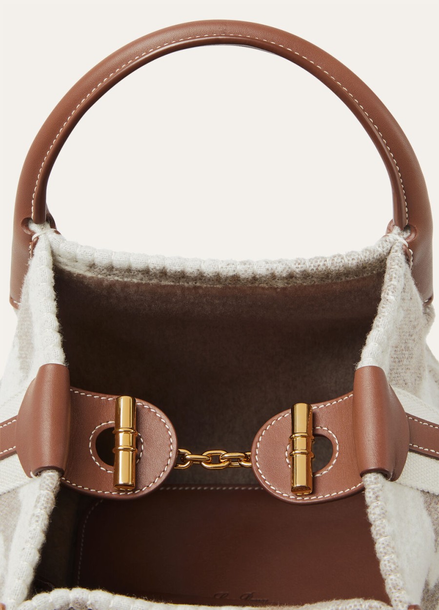 kleine tas van kasjmier scheerwol in de kleuren misty greywinter pebbleturquoisesun gold